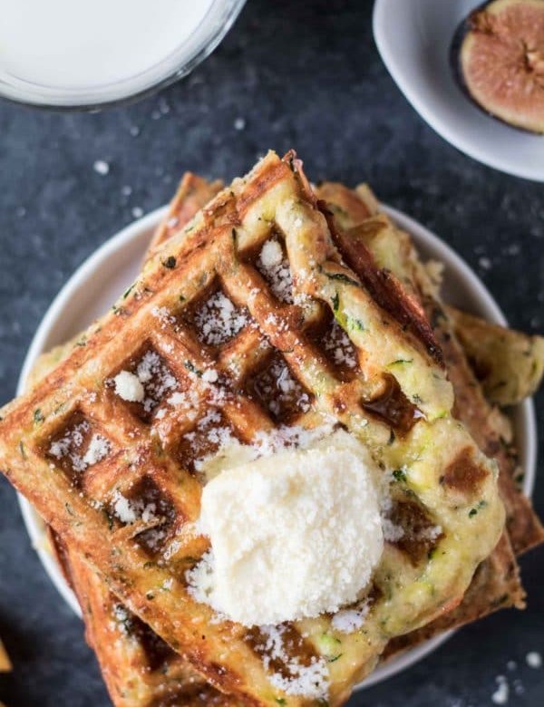 Zucchini Parmesan Waffles are a delicious way to celebrate National Waffle Day today! krollskorner.com
