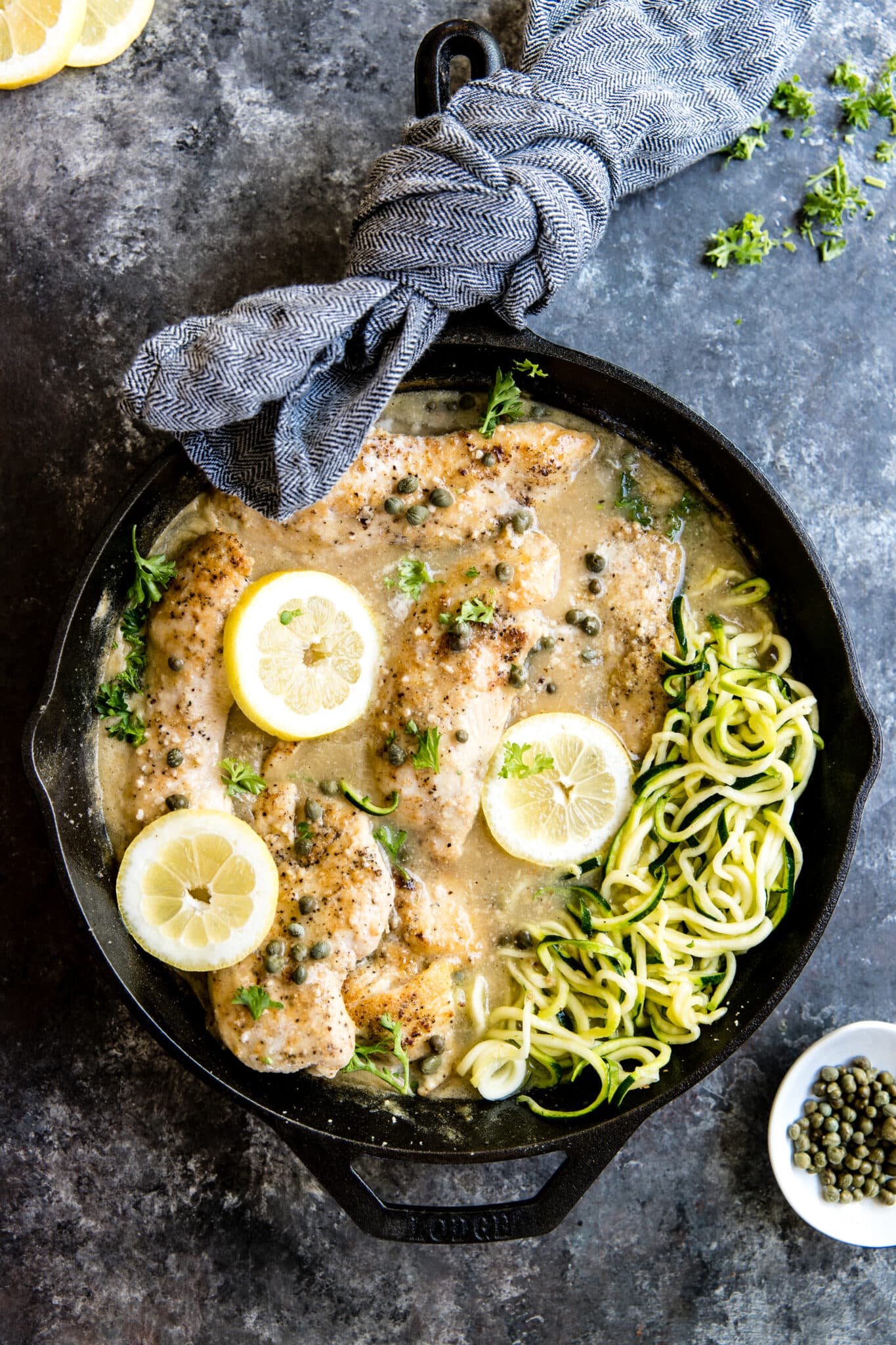 chicken piccata in a cast iron skillet