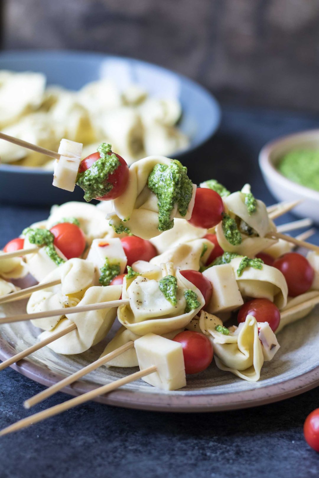 These tortellini skewers with lemon spinach pesto are a perfect light and satisfying appetizer! | Krollskorner.com