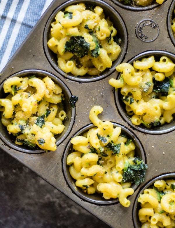 Macaroni and cheese with spinach in cupcake tins for individual portions