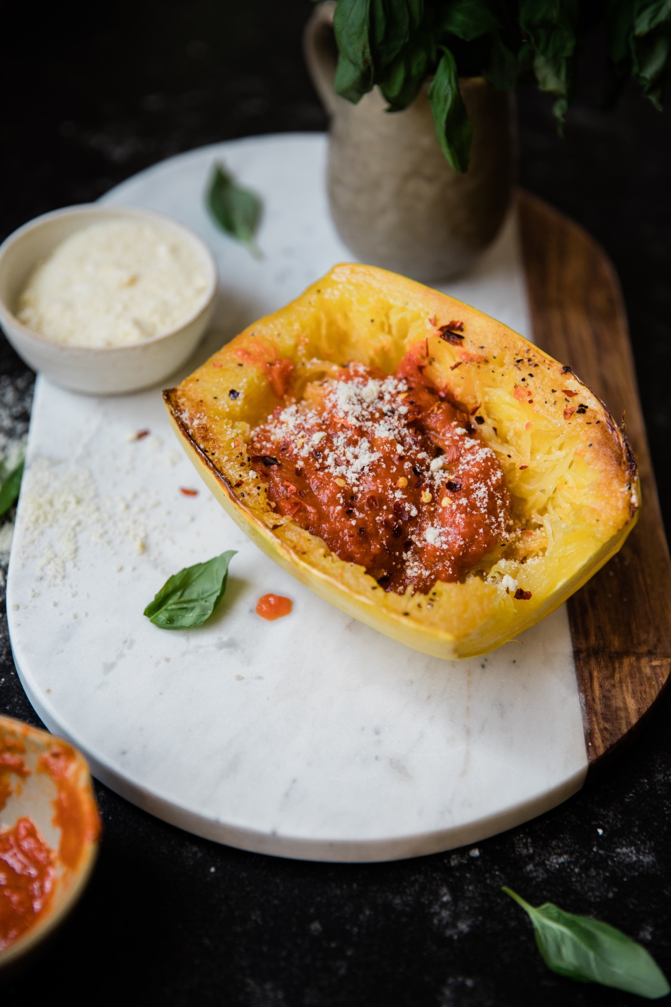 a cooked spaghetti squash on a marble board