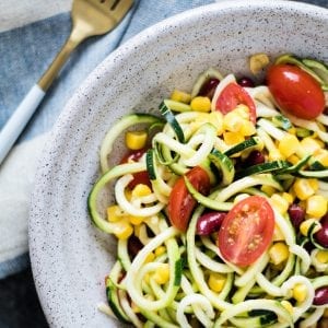 Zucchini and Corn Salad with a delicious 5 ingredient vinaigrette dressing! #easy #summer #salad #healthy #summersalad krollskorner.com