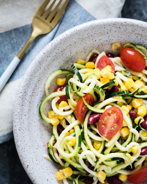 Zucchini and Corn Salad with a delicious 5 ingredient vinaigrette dressing! #easy #summer #salad #healthy #summersalad krollskorner.com