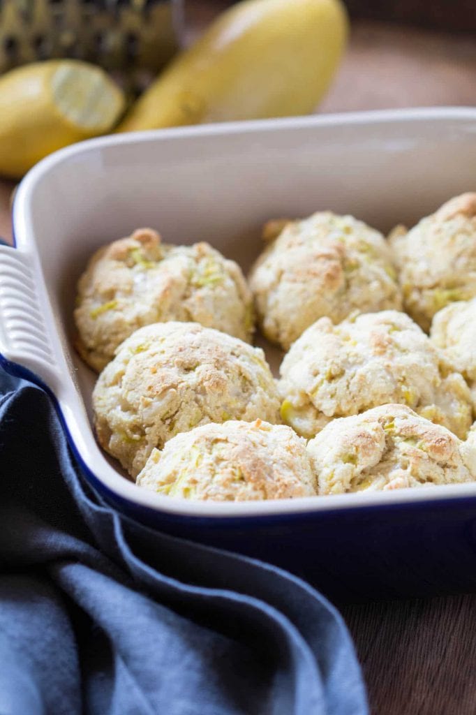 cheesy yellow squash biscuits in a baking dish