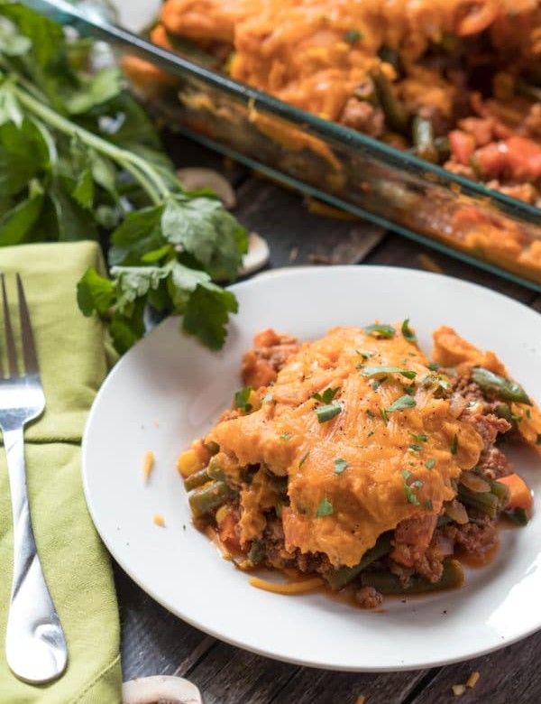 This healthy shepherd's pie is layered with ground turkey and veggies topped with whipped sweet potatoes and a savory mushroom gravy. |Krollskorner.com