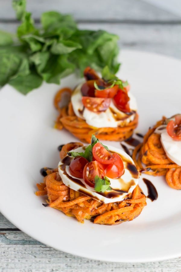 This appetizer is a fun way to incorporate spiralized veggies & an easy way to impress your guests! The combo of fresh mozzarella and basil is always a win! |Krollskorner.com