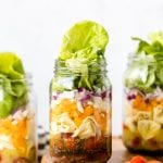 tortellini, butter lettuce and salads fixin's in a mason jar