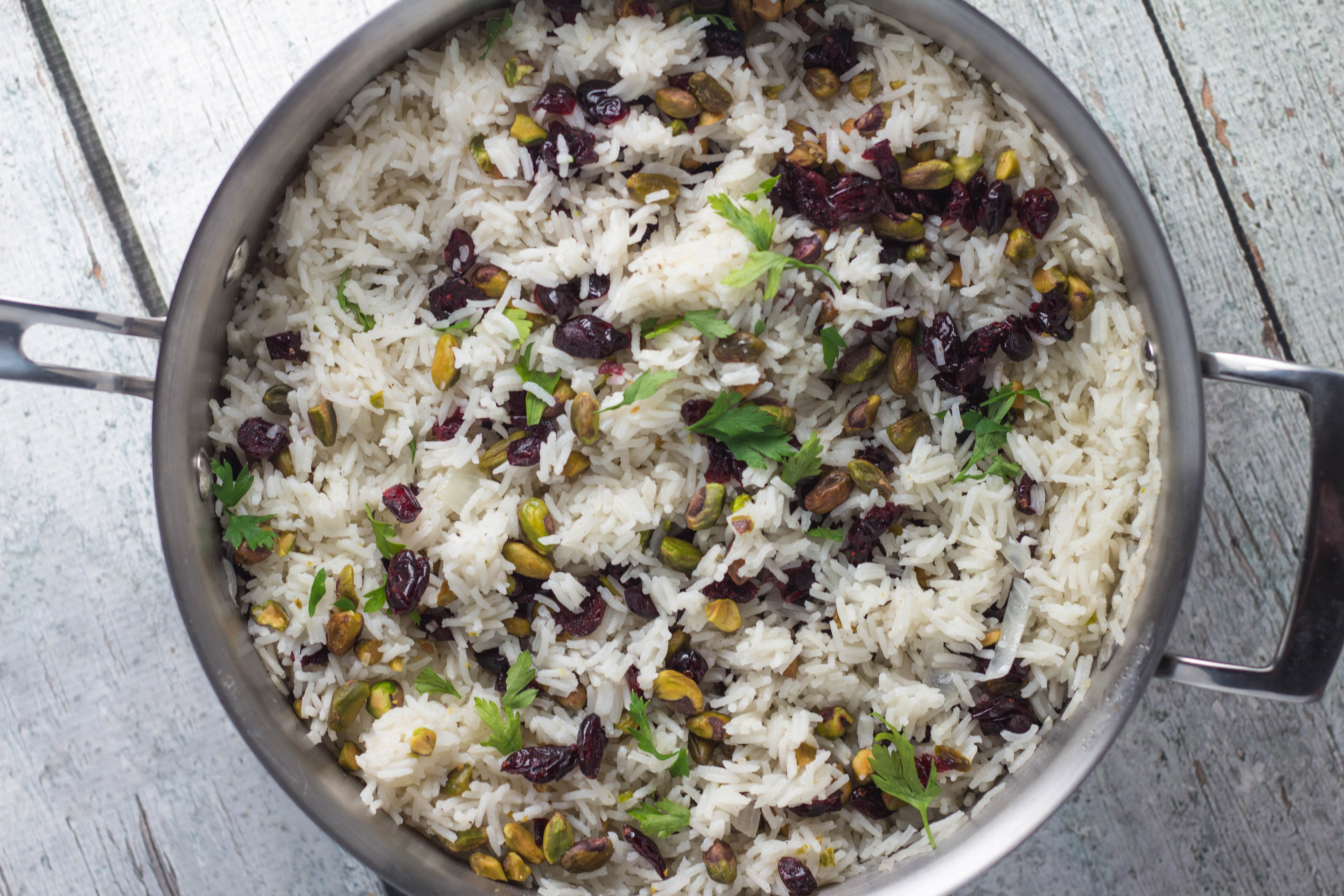 This pistachio pilaf has a perfect flavor combination with the slight sweetness from the dried cranberries and a nice crunch from the pistachios. Krollskorner.com