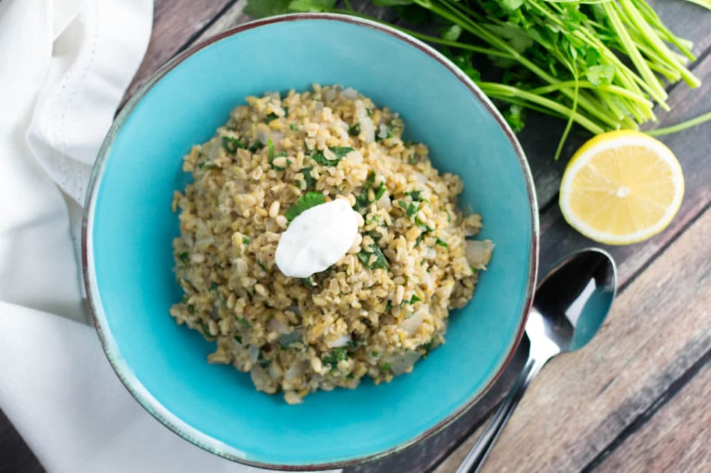 Freekeh Pilaf is a nutritious alternative to rice pilaf, full of fiber and protein! Ancient grains are making there way into 2017! |krollskorner.com