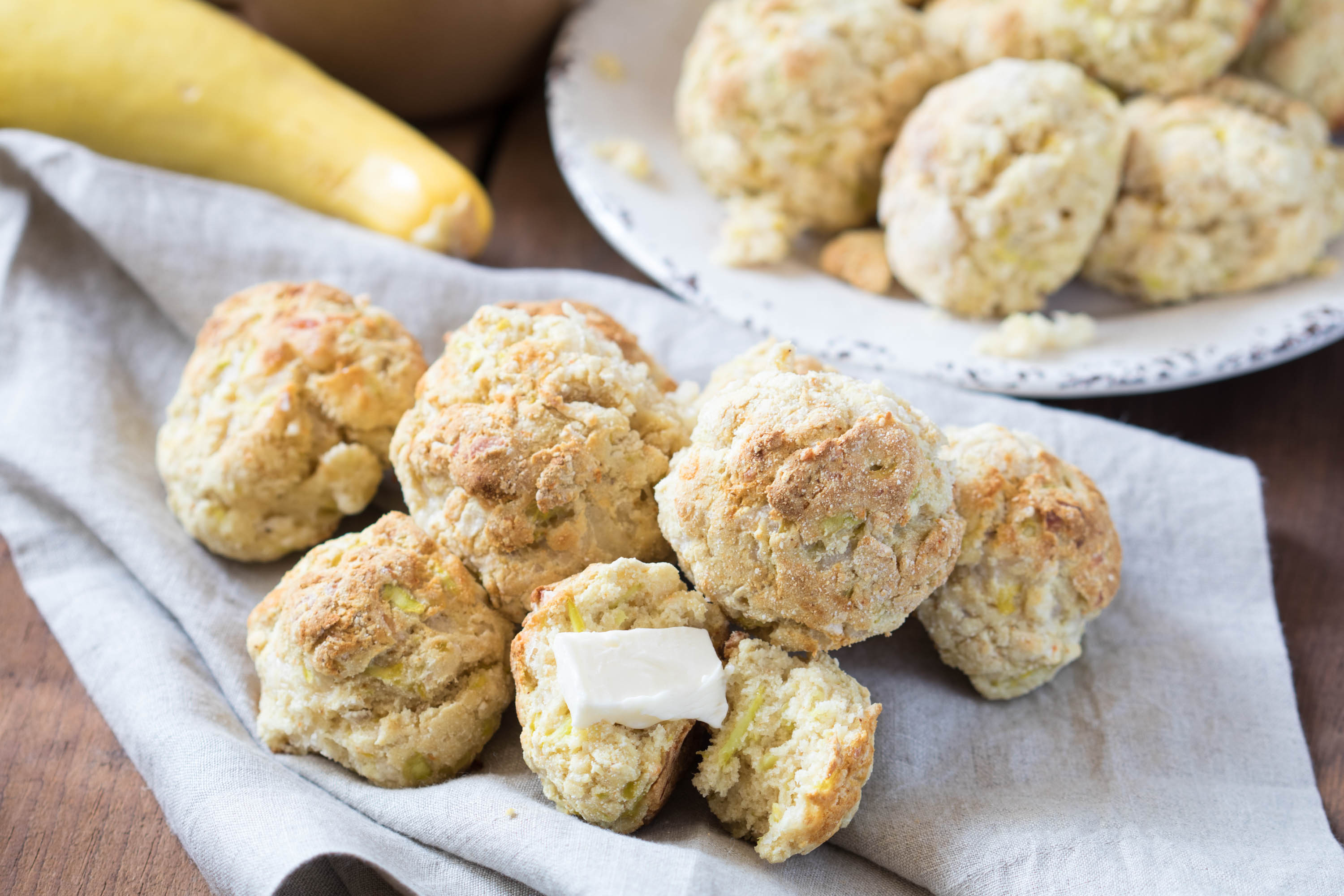 cheesy yellow squash biscuits on a napkin