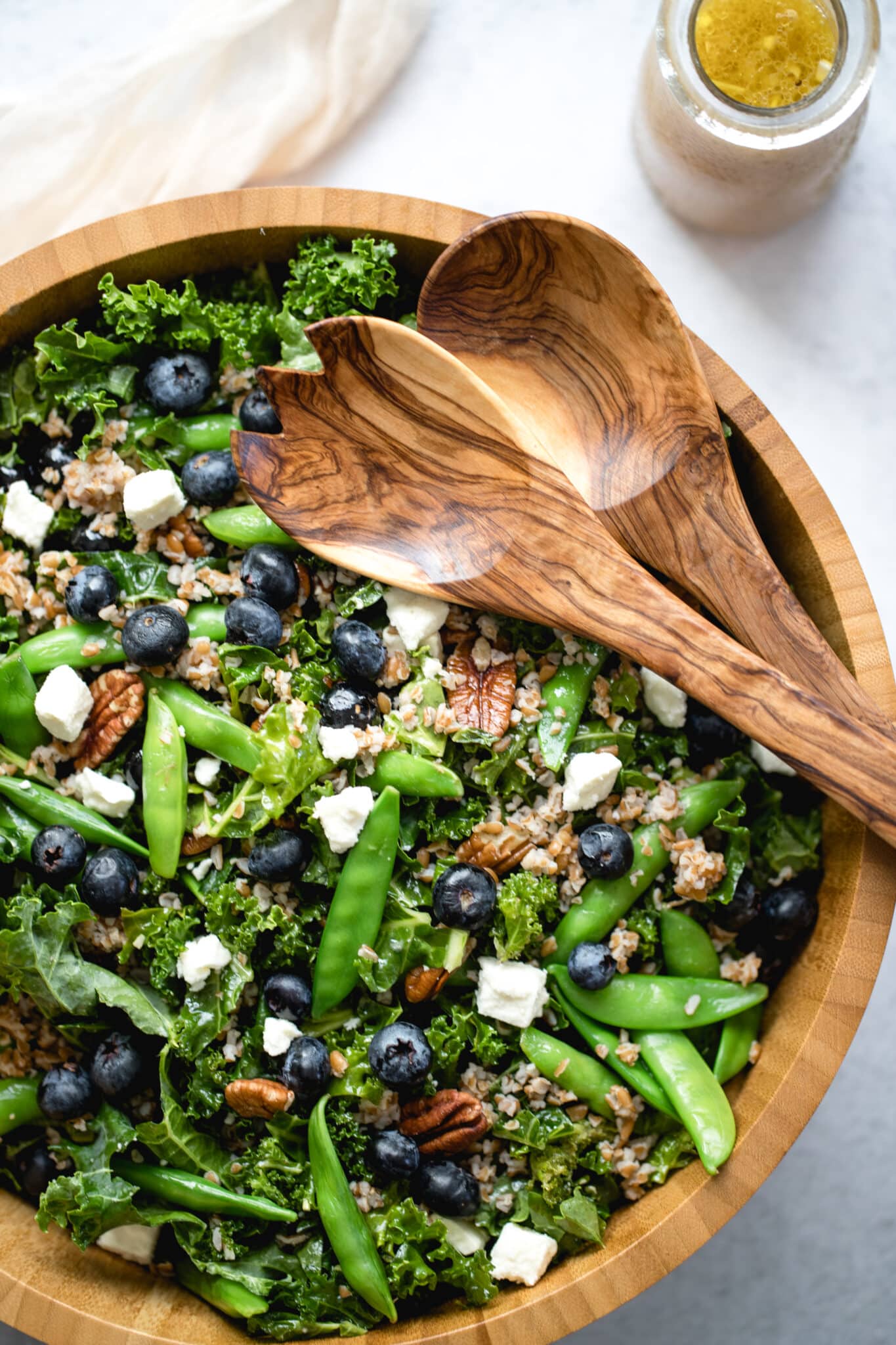 kale salad in a wood bowl