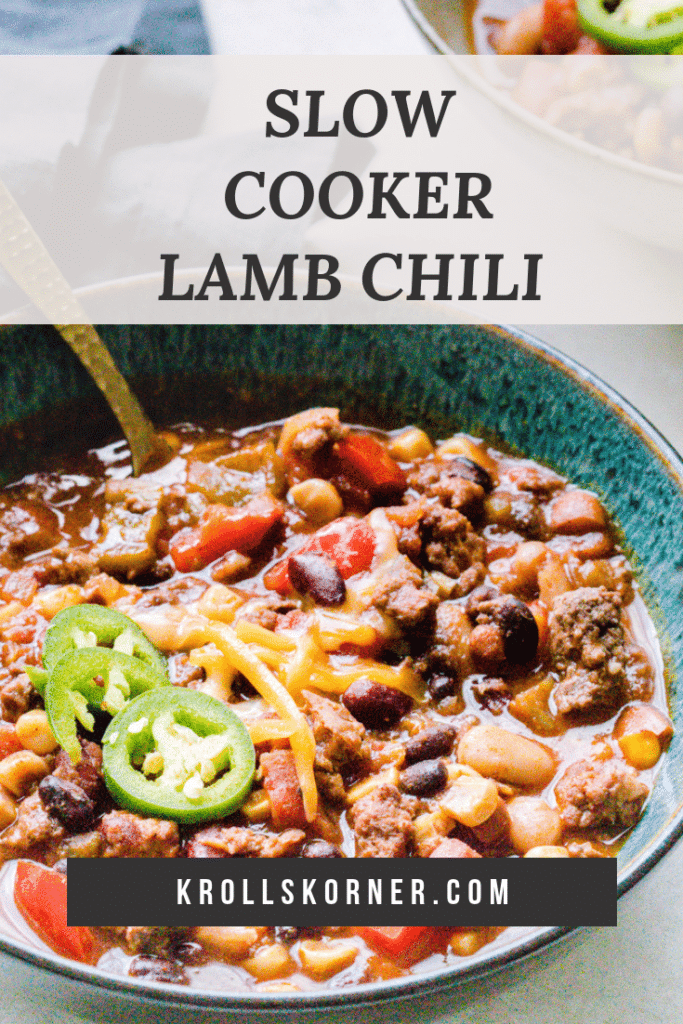 Lamb Chili in a bowl topped with jalapenos with a grey napkin on the side