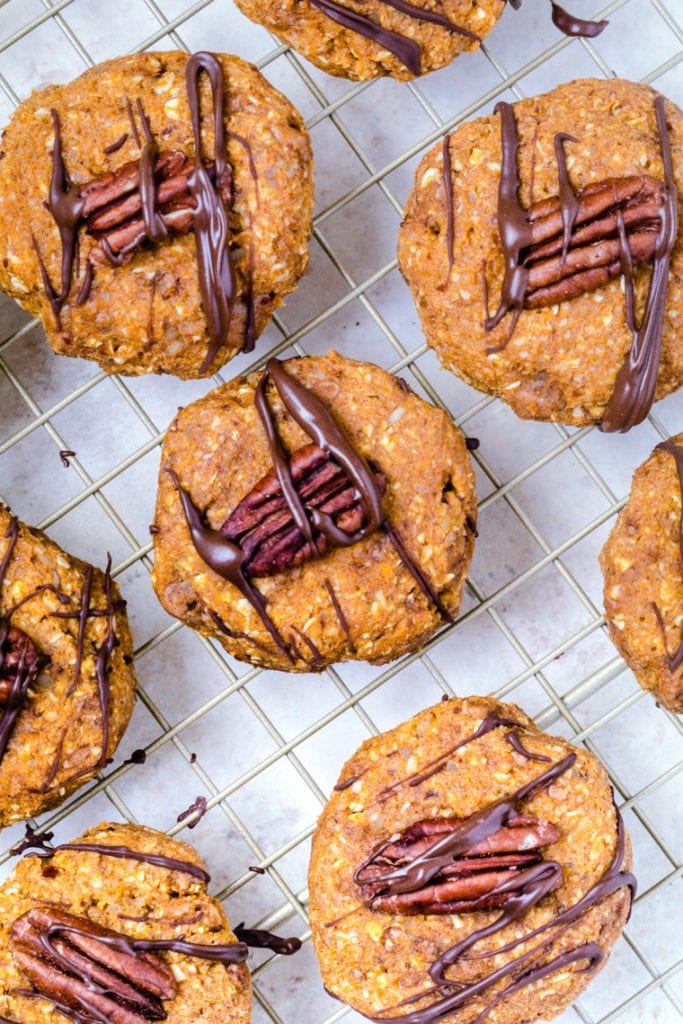 Pumpkin Pecan Cookies made with Medjool Dates topped with a pecan.