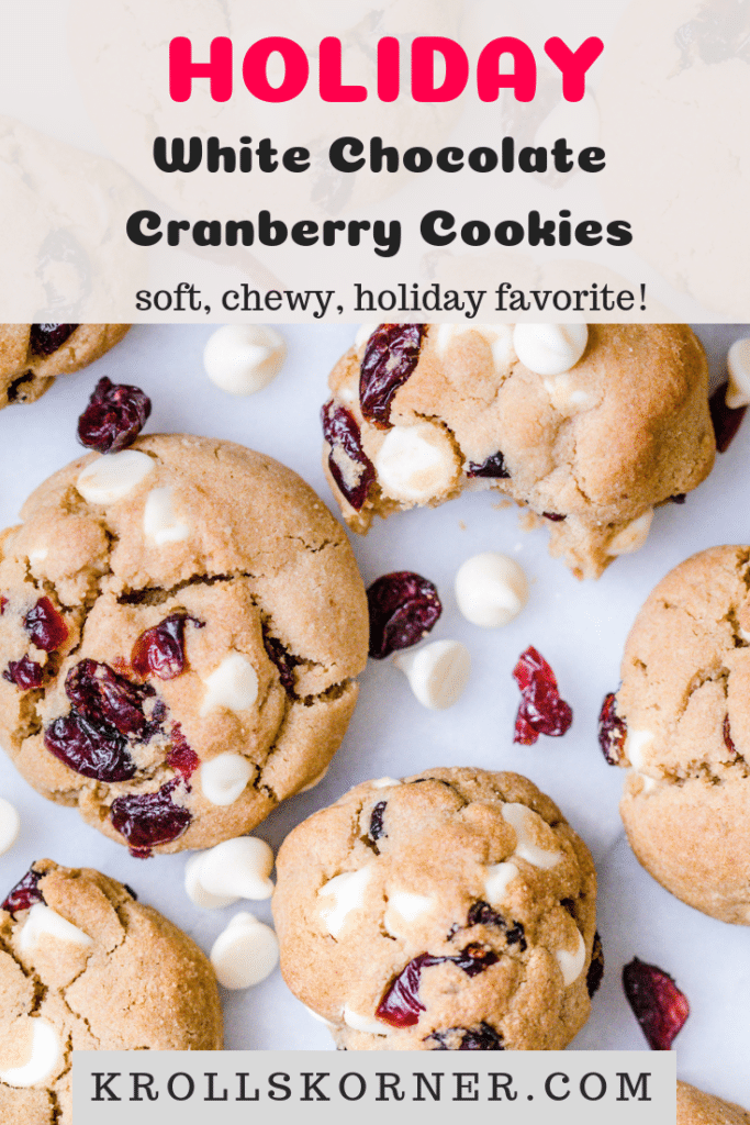 White chocolate cranberry cookies on a marble slab