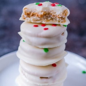 ritz crackers dunked in white chocolate stacked on top of each other
