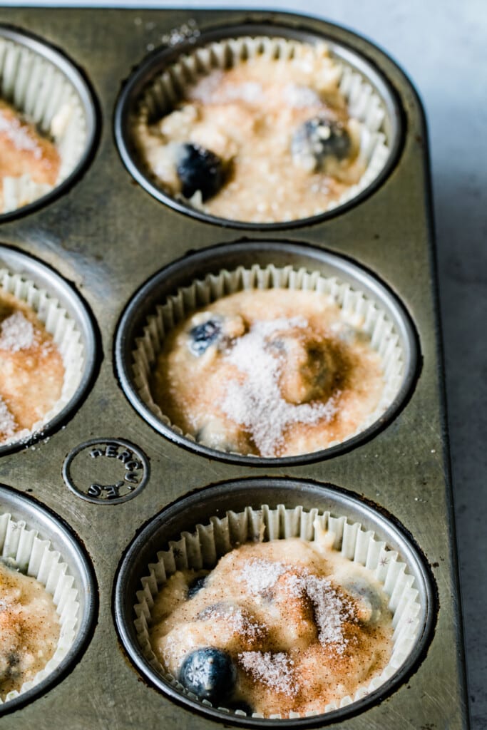 blueberry muffins in a muffin tin