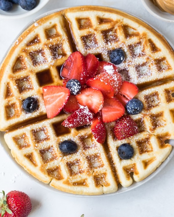 buttermilk waffles on a white plate