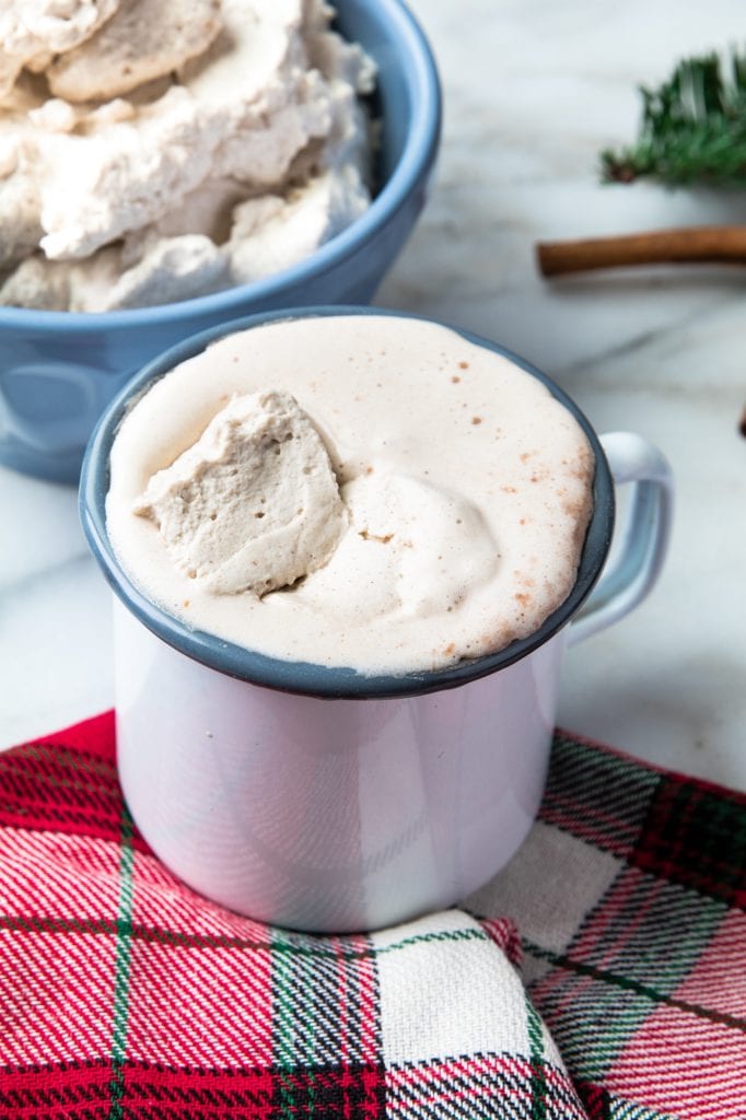 hot cocoa with gingerbread whipped cream on top