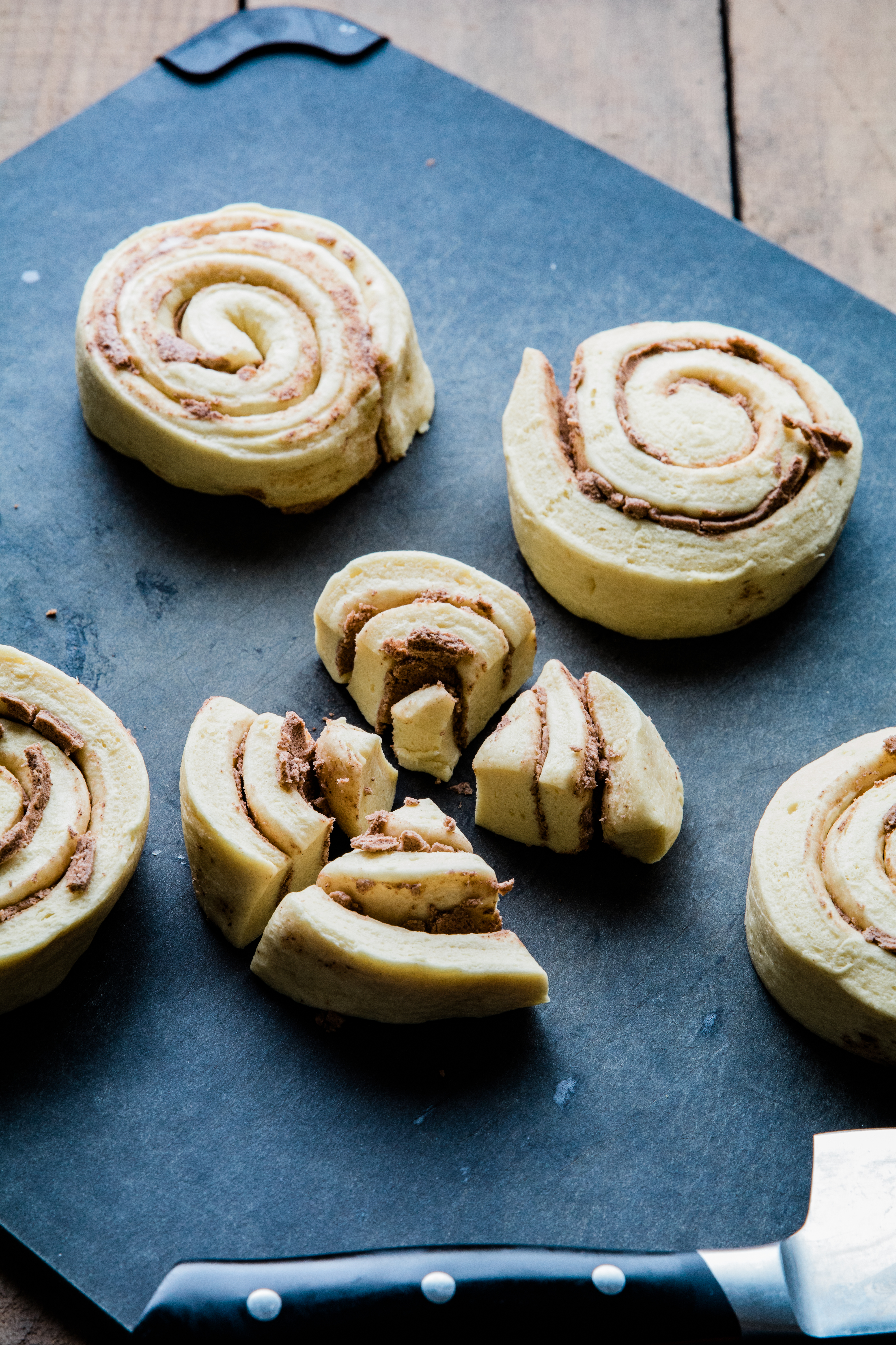 cinnamon rolls on a cutting board