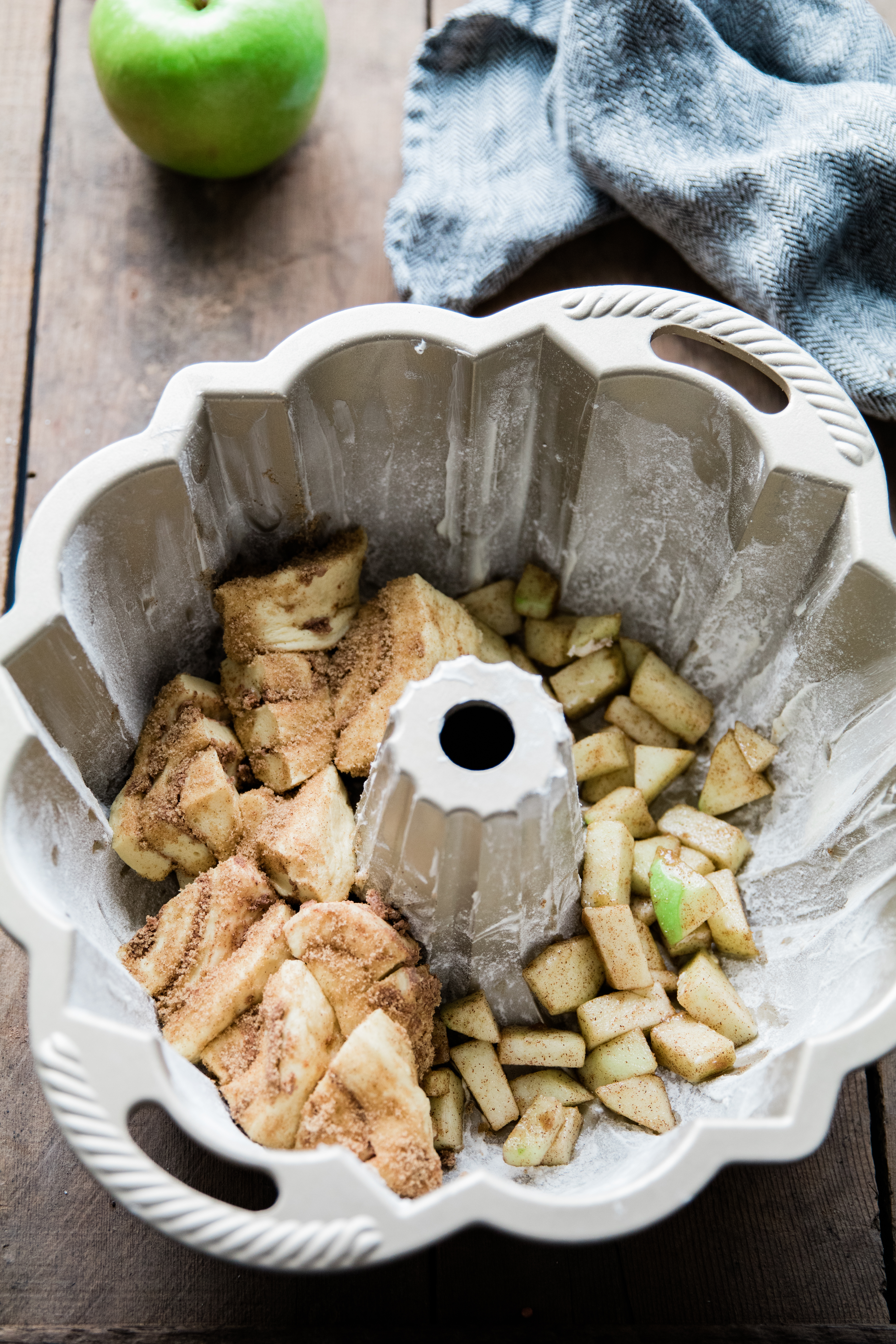 apples and cinnamon bread in a bundt pan