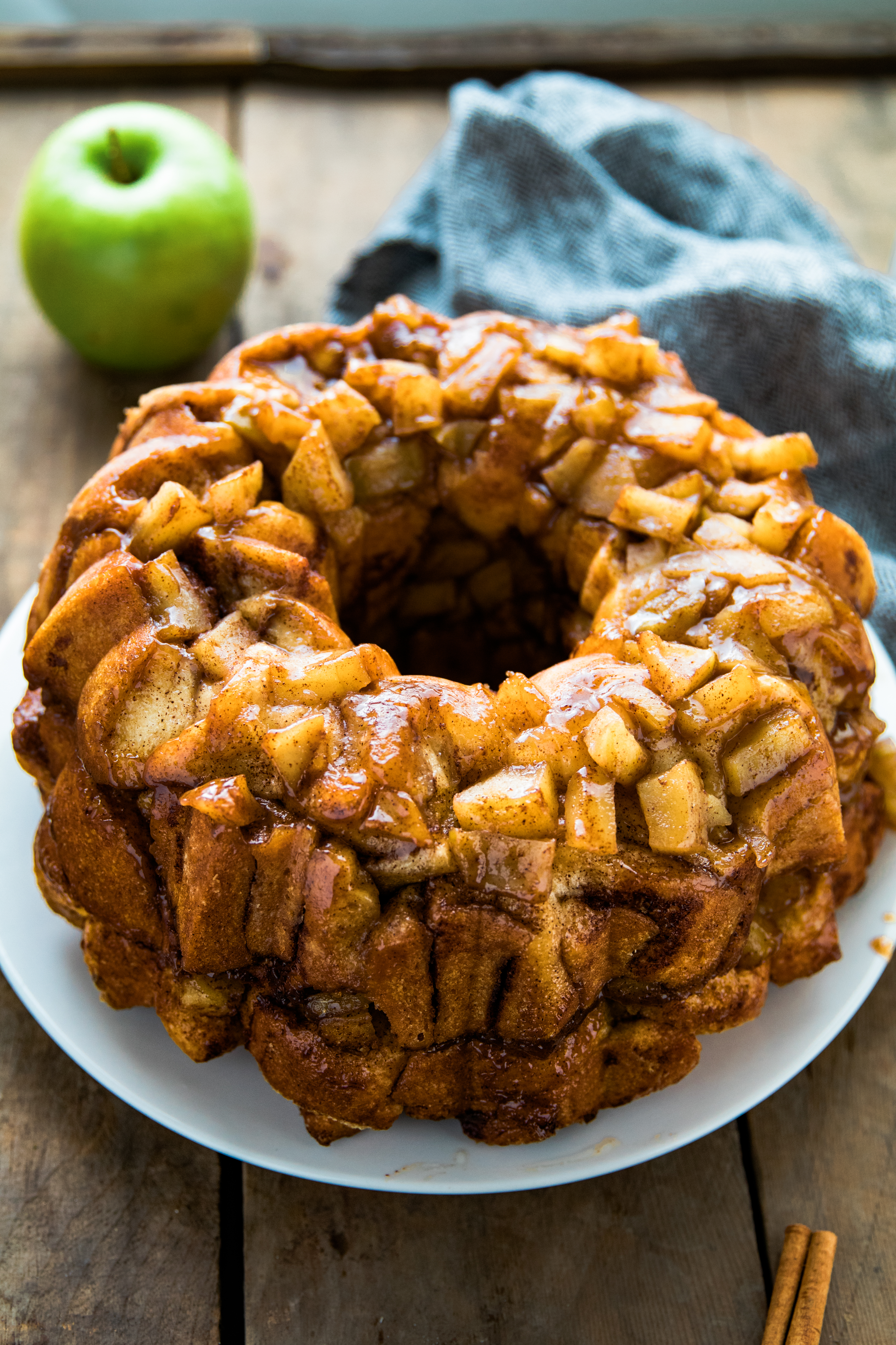 apple cinnamon monkey bread on a white plate