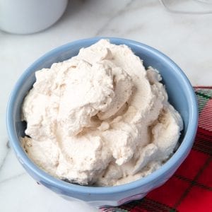 homemade whip cream in a blue bowl