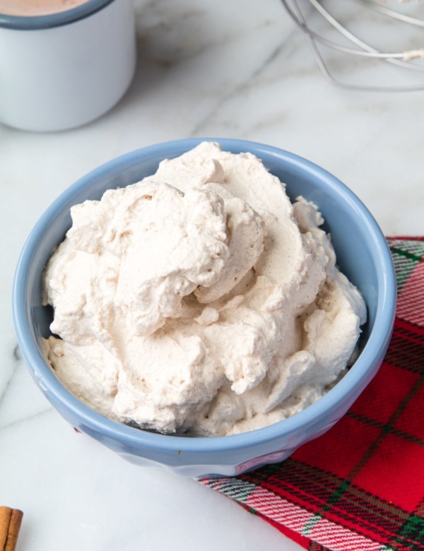 homemade whip cream in a blue bowl