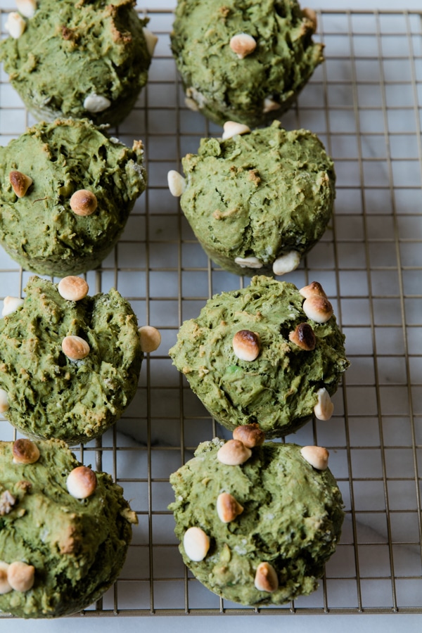 matcha muffins on a cooling rack