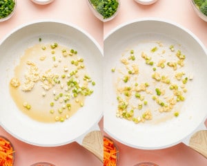 Garlic and chopped green onions cooking in sesame oil in a skillet, beginning to soften and become fragrant.