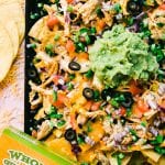 sheet pan nachos with chicken and guacamole