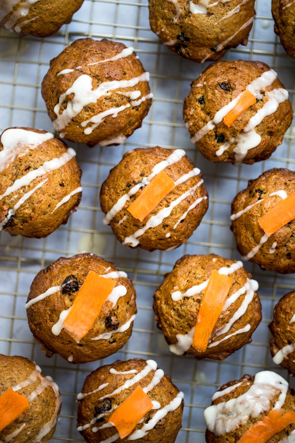 mini carrot cake muffins with glaze on top