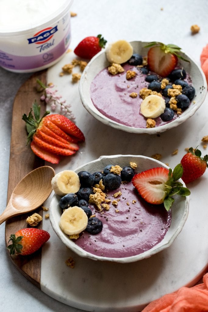 smoothie bowl topped with fresh berries and banana