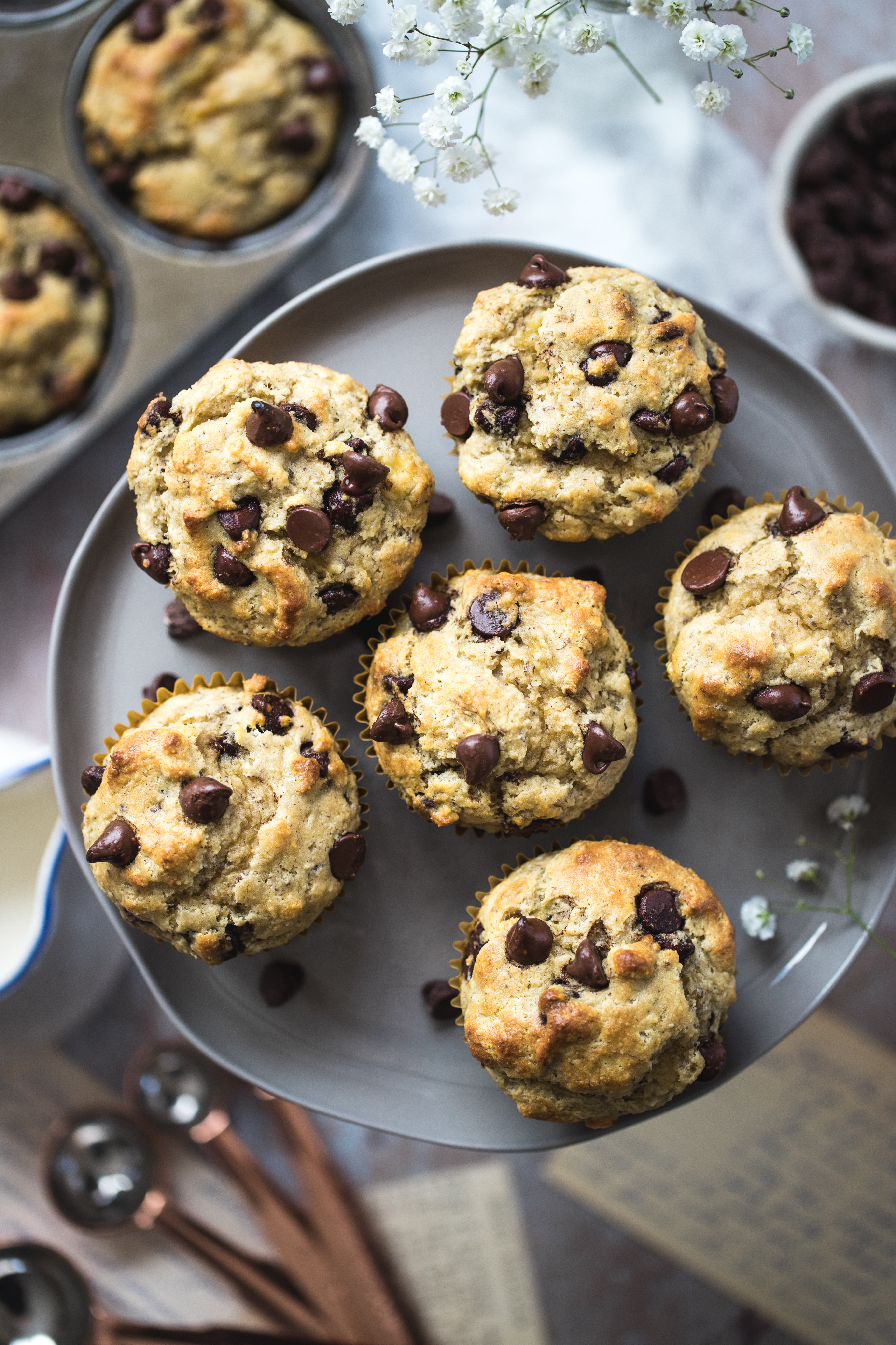 almond flour chocolate chips muffins on a cake stand