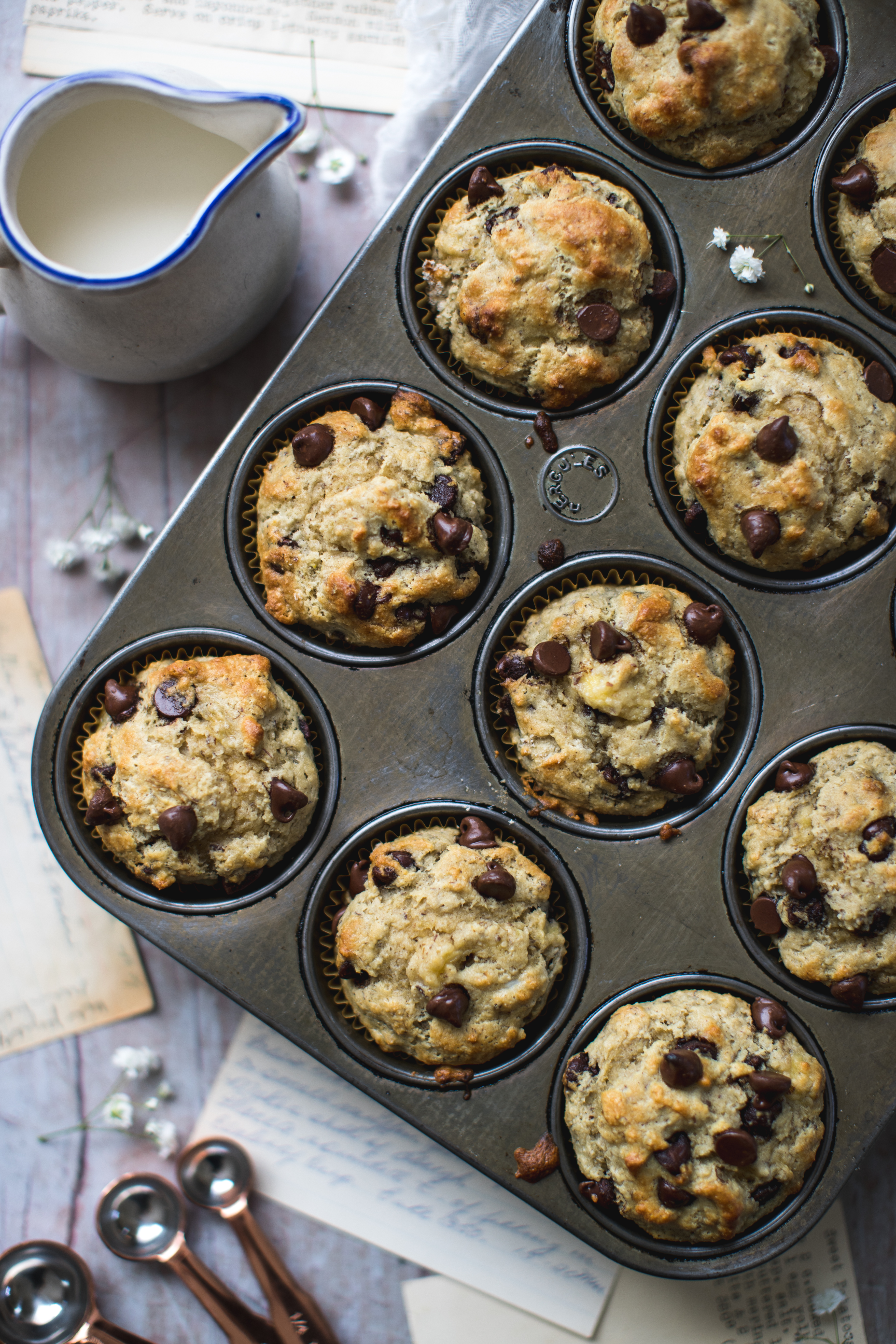 almond flour chocolate chips muffins in a cupcake tin