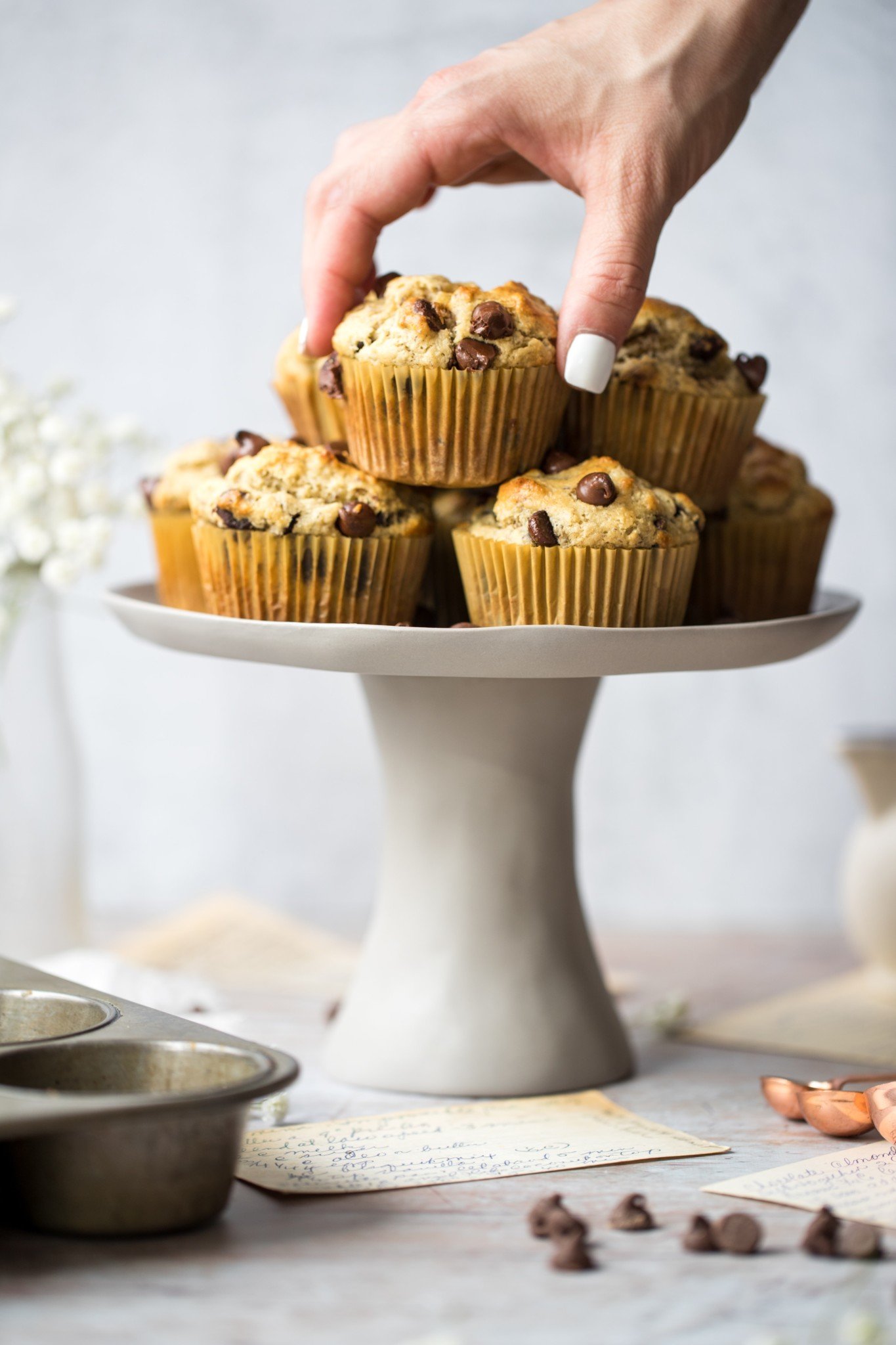 almond flour chocolate chips muffins on a cake tray