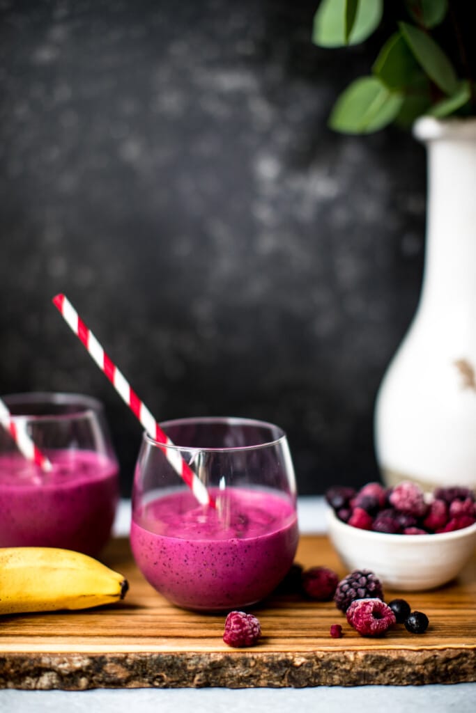 blueberry smoothie in stemless wine glasses