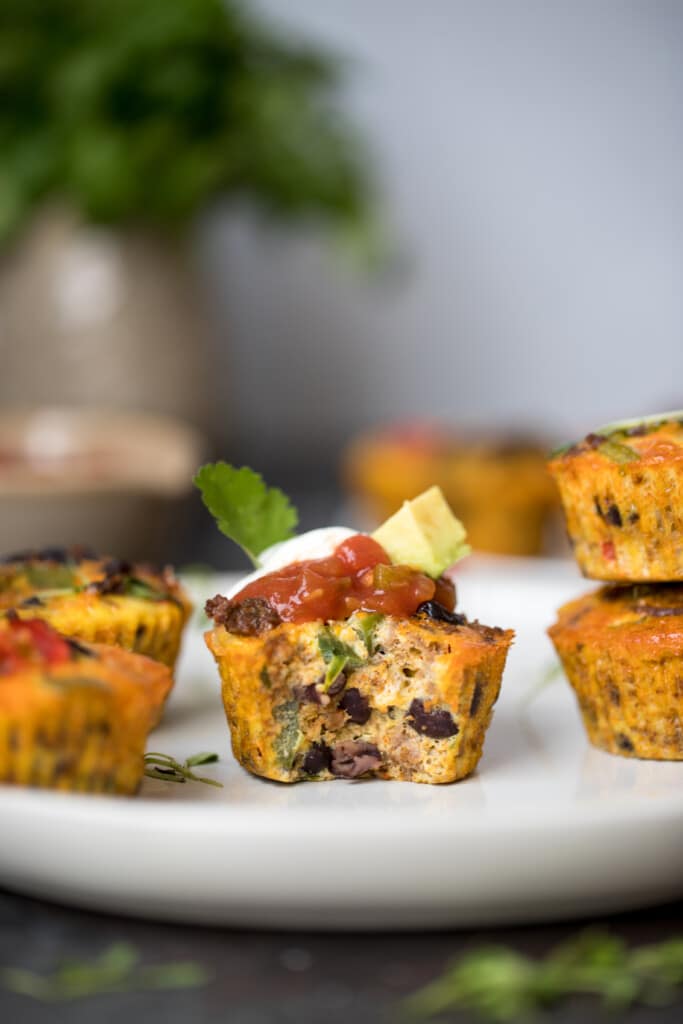 egg taco breakfast muffins on a white plate