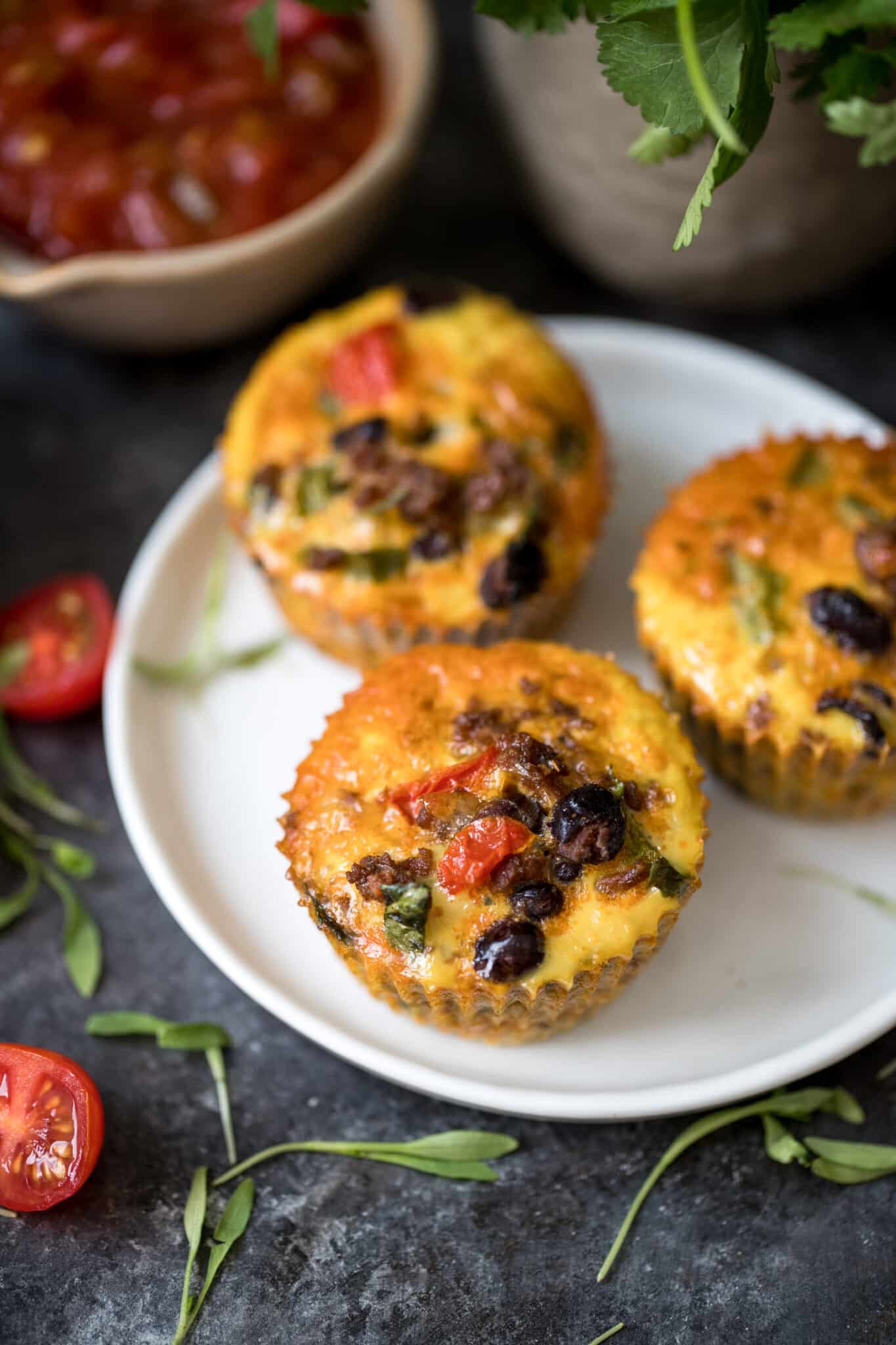 egg taco breakfast muffins on a white plate