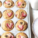 strawberry banana muffins in a muffin tin