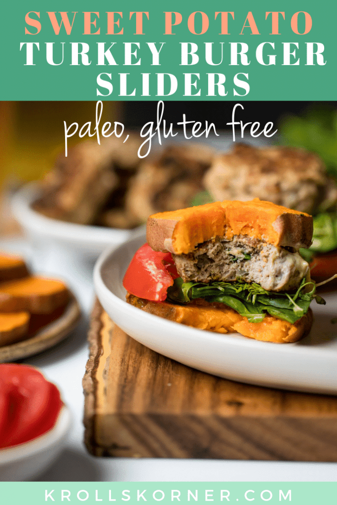 a turkey burger on a white plate with sweet potato