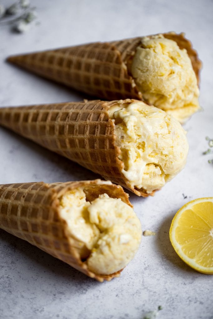 Lemon ice cream in a waffle ice cream cone 