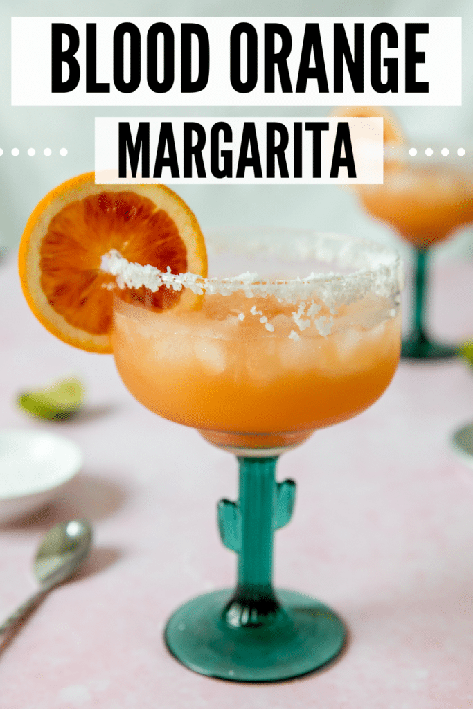 blood orange margarita in a margarita glass