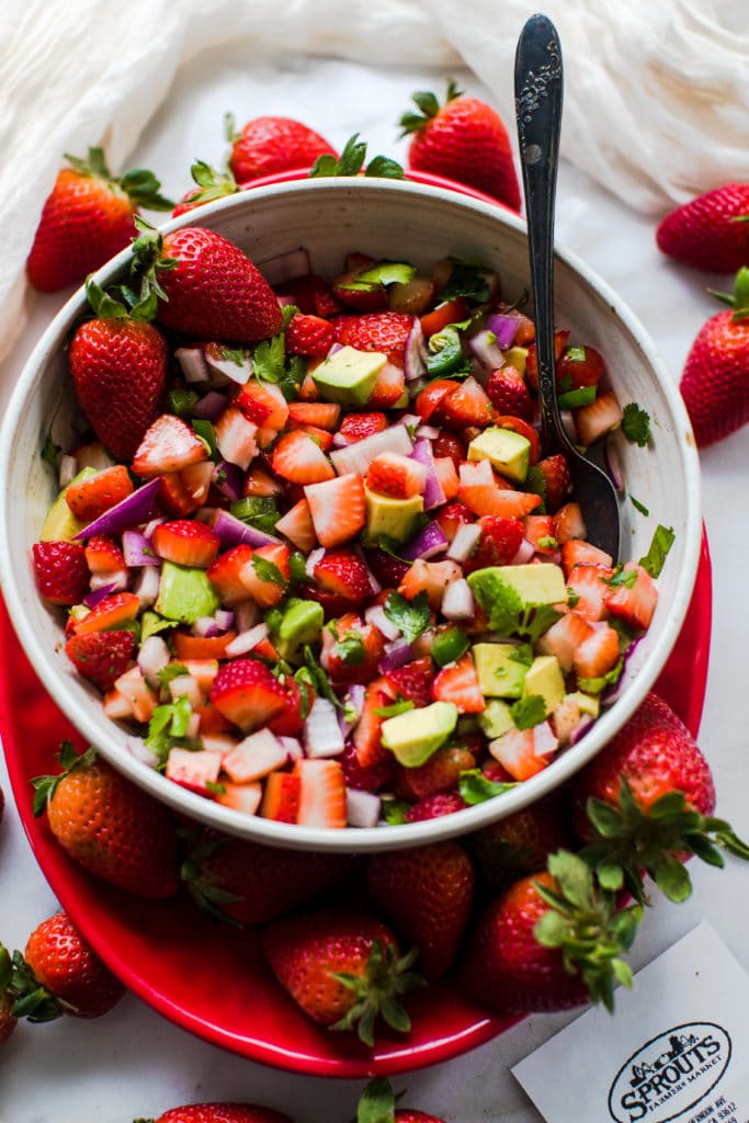 strawberry salsa on a red plate