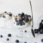 a blueberry parfait in a parfait glass