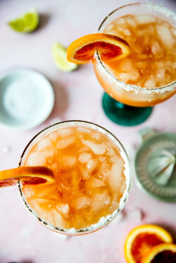 blood orange margarita in a margarita glass