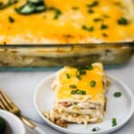 chicken enchilada casserole on a white plate