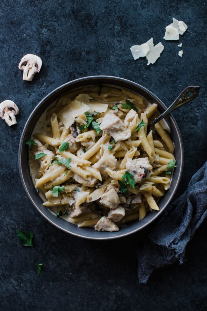 chicken and penne noodles in a bowl