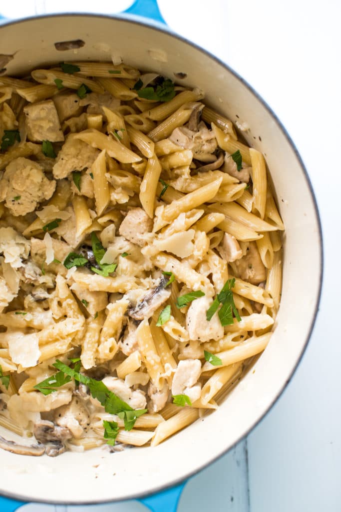 chicken and penne noodles in a bowl