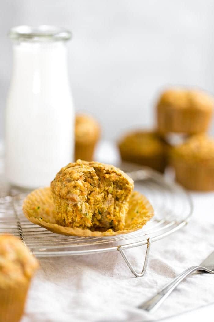 zucchini carrot muffin on a cooling rack