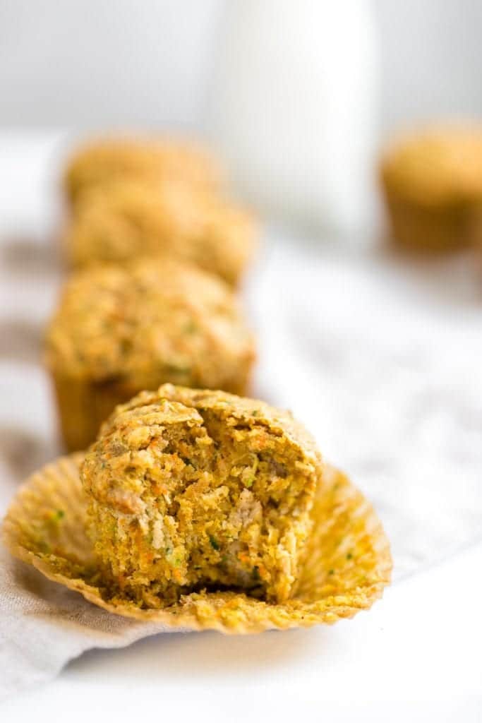 zucchini carrot muffin on a cooling rack